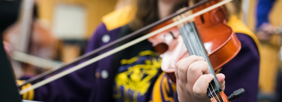 Student playing the violin