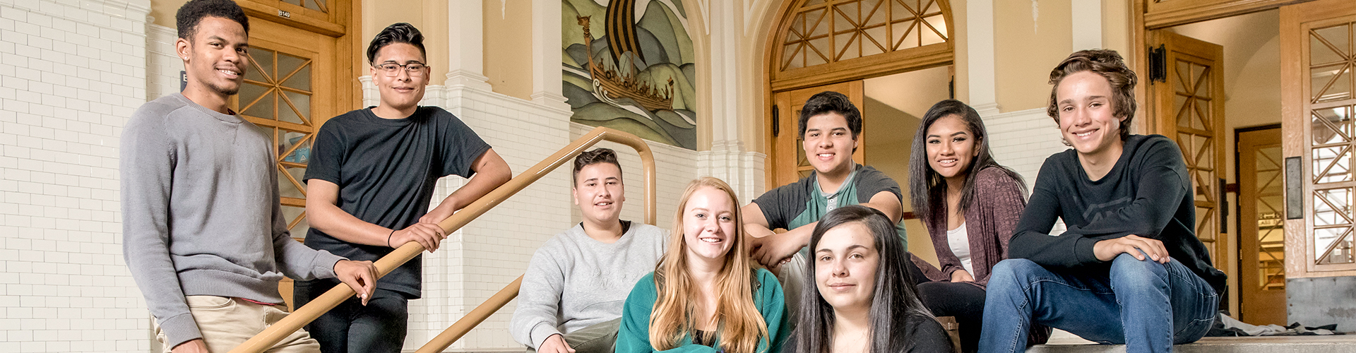 North High School students posing on the steps of a staircase